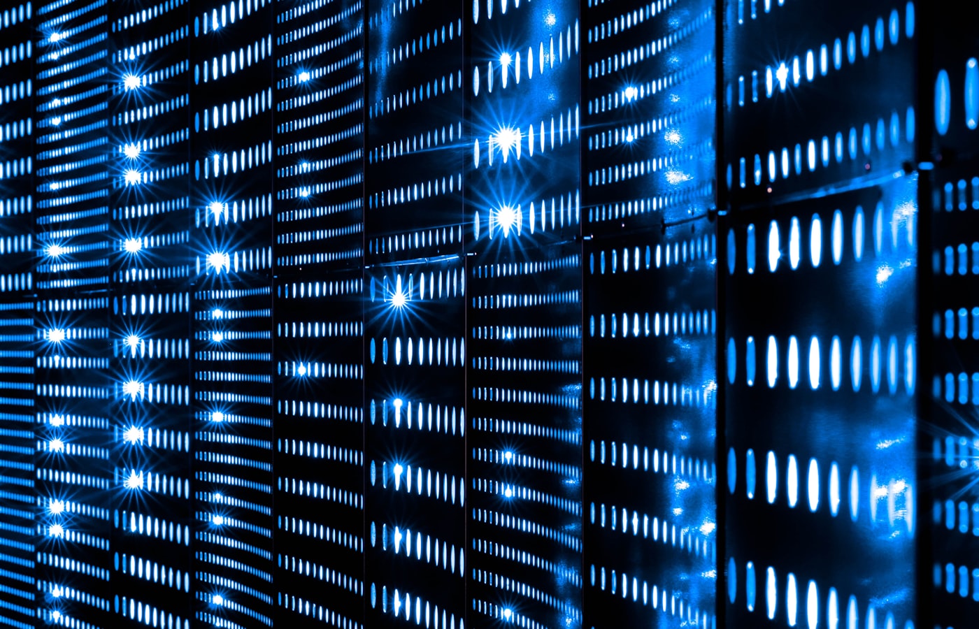 Close-up of illuminated blue server hardware representing database infrastructure